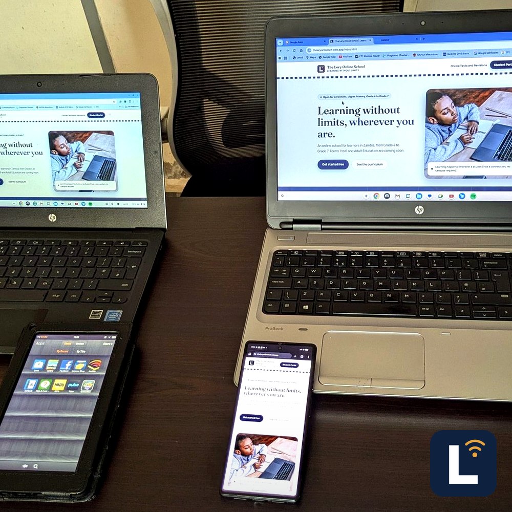 The Lory Online School shown on a laptop, tablet, and phone