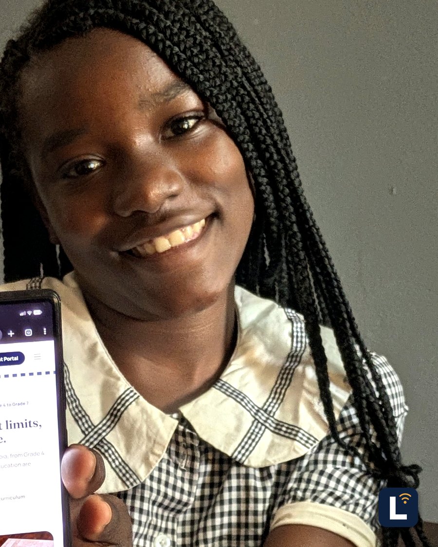 A Lory Online School student showing the Learning Portal on her phone
